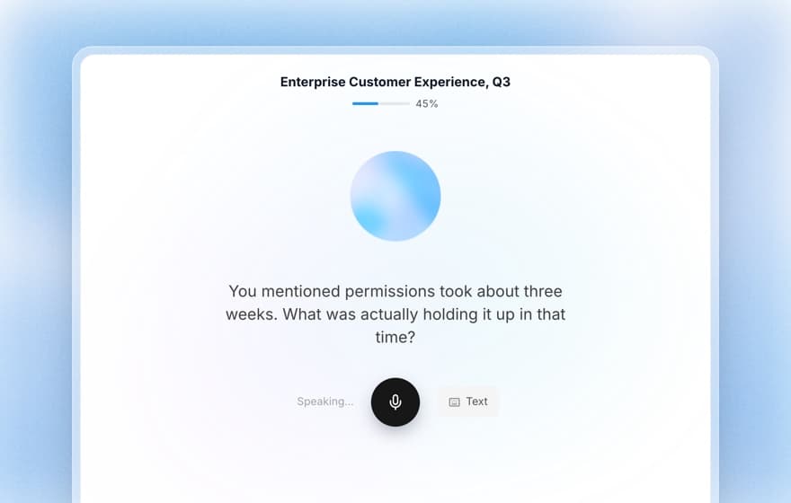 Koji voice interview in progress with an AI orb asking a follow-up question and a microphone button